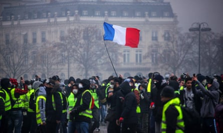 Demonstrators gather near the Arc de Triomphe