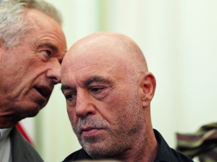 RFK Jr whispers into the ear of Joe Rogan