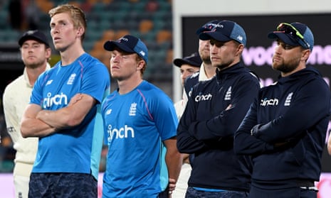 The faces tell the story as Joe Root (second from right) and his England teammates watch Australia’s Ashes victory presentation on Sunday in Hobart.
