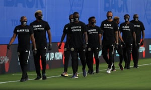 Players of Columbus Crew participate in a Black Lives Matter pre-game ceremony before match between Orlando City and Inter Miami as part of MLS is back Tournament