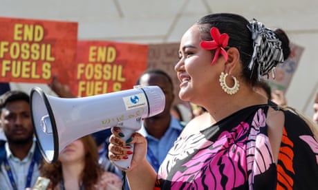 Protesters at Cop28 calling for an end fossil to fuels.
