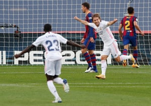 Luka Modric celebrates after his late goal ensured victory for Real Madrid.
