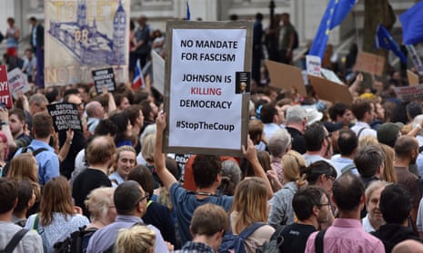 Protesters gather outside the gates of Downing Street in opposition to Boris Johnson's decision to prorogue parliament