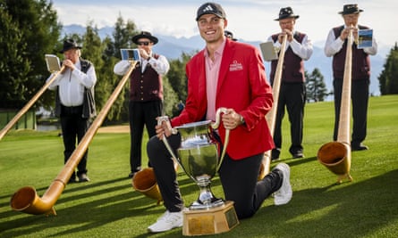Åberg poses with the European Masters trophy after winning in Switzerland in 2023.
