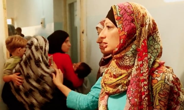 Rola Hallam helping to evacuate parents and children from a hospital in Jabal Zawieh.