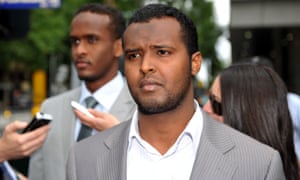 Yacqub Khayre (centre) and Abdirahman Ahmed (left) leave court in Melbourne in December 2010 after being acquitted of planning an alleged terrorist attack on the Holsworthy army base in Sydney.