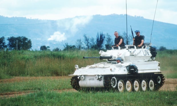 A UN tank helps civilians evacuate from Kigali, Rwanda, 1994. 