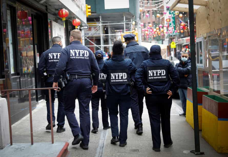 Members of the New York police department patrol in the Chinatown section of Manhattan in New York City.