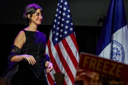 a woman smiles on stage