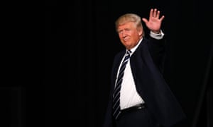 US Republican presidential candidate Donald Trump exits his final rally of the GOP 2016 presidential campaign at Devos Place in Grand Rapids, Michigan on November 7, 2016. / AFP PHOTO / JEFF KOWALSKYJEFF KOWALSKY/AFP/Getty Images