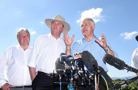 Federal member for Flynn, Ken O’Dowd, left, the deputy prime minister and agriculture minister, Barnaby Joyce, and the prime minister, Malcolm Turnbull, during a press conference at the Aus Sweetpotato Farm in Rockhampton on Thursday.