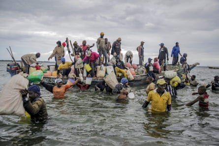 Artisanal fishers in Gazi Bay, Kenya, unload the latest catch 