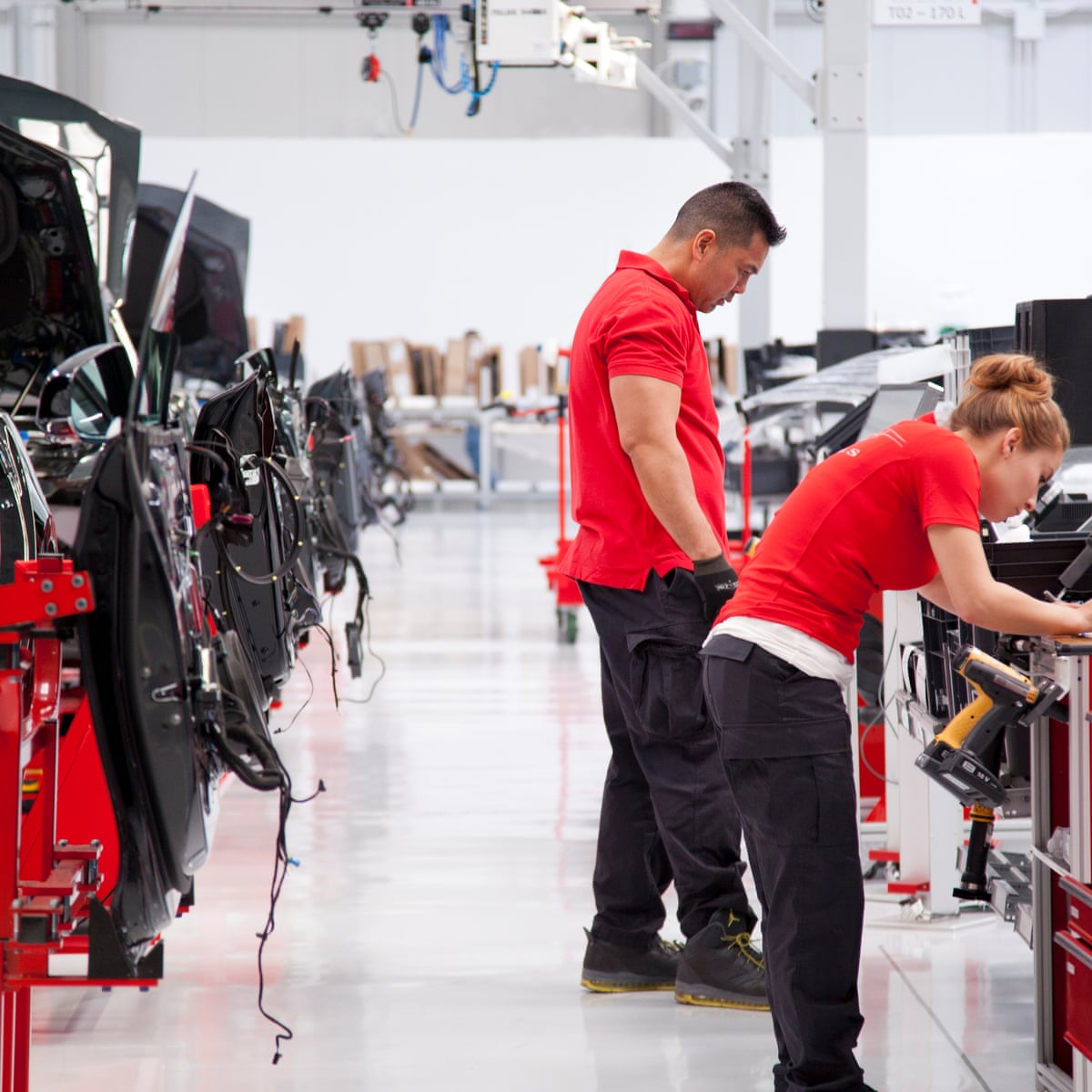 Tesla Workers Say They Pay The Price For Elon Musk S Big Promises Tesla The Guardian