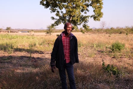 Julius Chibonda on the land where he lived for six months