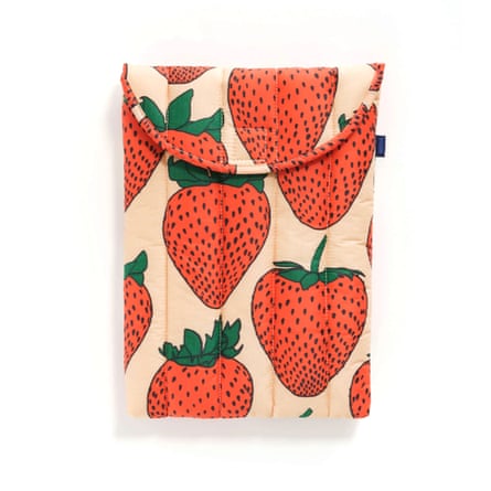 Cream-coloured laptop sleeve with large illustrated stawberries printed on it