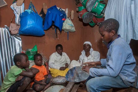 Gift Phiri makes charcoal stoves at his grandmother Rachel Banda’s house