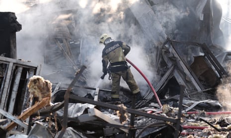 Rescuers put out fires in Darnytskyi district of the city on 21 September 2023 in Kyiv, Ukraine. Russia launched more than 20 missiles on the capital of Ukraine, which Ukrainian Air Defence Forces say were shot down. 