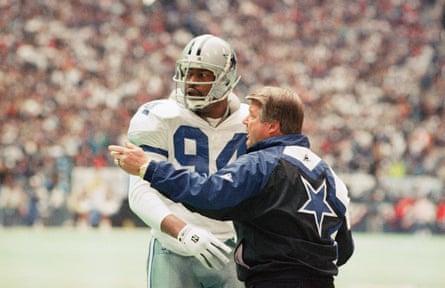 The Dallas Cowboys’ coach, Jimmy Johnson, gives instructions to Charles Haley successful 1994