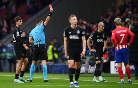 Celtic’s Daizen Maeda is sent off by the referee, Ivan Kruzliak, after a VAR check