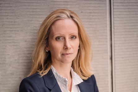 Lucy Rigby in a navy blazer and white shirt