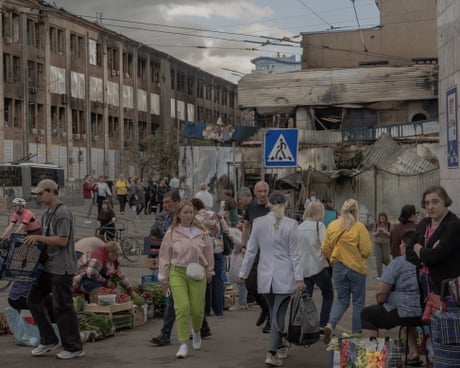 ‘Looks like Chornobyl’: life in Kyiv’s most bombed neighbourhood as Ukraine braced for new mass strike