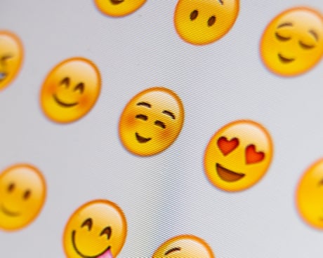 Text therapy: study finds couples who use emojis in text messages feel closer