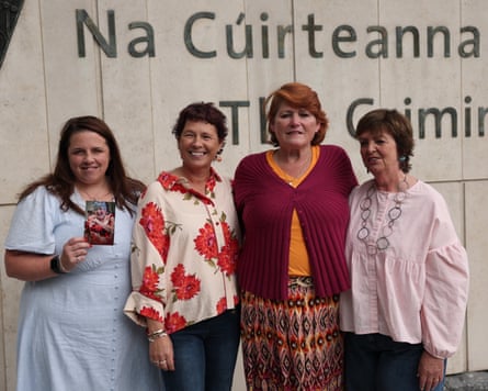 Poole stands for a photograph with three other women outside the court