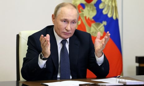Russian President Vladimir Putin appears at a video conference outside Moscow on October 5, where he has vowed to 'stabilize' the situation in Ukraine's four annexed regions.