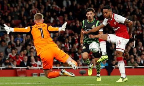 Theo Walcott scores Arsenal’s winner against Doncaster Rovers at the Emirates Stadium
