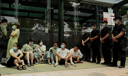 Protesters at the Evergrande headquarters building in Shenzhen, south-east China.