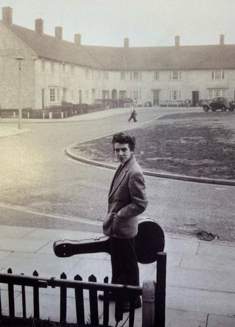George Harrison outside his childhood home in Speke.