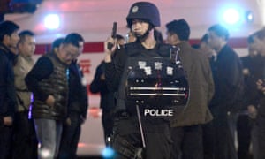 Police in Kunming, the capital of Yunnan province, where Yang Qingpei was arrested.