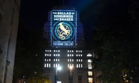 Raising the roof … cover art for The Ballad of Songbirds and Snakes projected on to Senate House in central London.