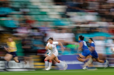 Jess Breach of England runs clear of the Samoa defence.