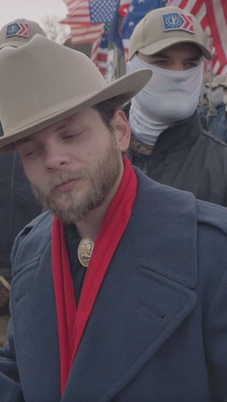 Men in hats, one of them masked.