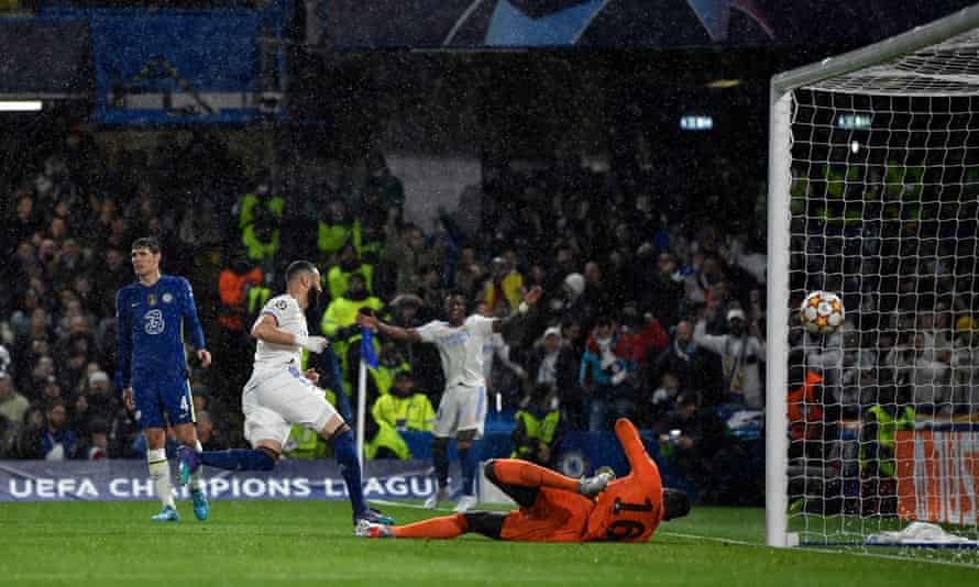 Real Madrid’s Karim Benzema wheels away in celebration after scoring their first goal.
