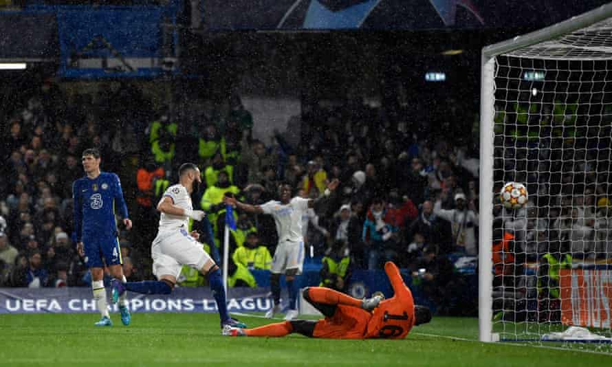 Real Madrid’s Karim Benzema wheels away in celebration after scoring their first goal.