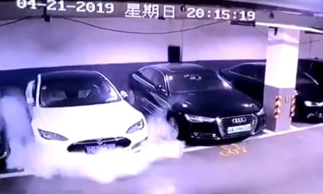 Tesla investigates video of parked car bursting into flames