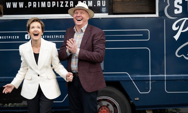 Outlandish … the Ramsay Street party rages around Karl and Susan Kennedy.