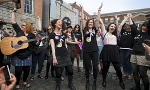 Women celebrate the result in Dublin