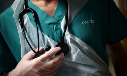 A Doctor holding his stethoscope