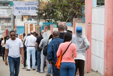 Voters queue to cast their ballots. More than 9.3 million people registered to vote in this year’s general election.