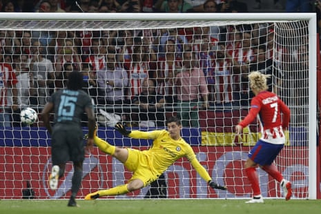 Atlético’s Antoine Griezmann thumps the ball down the middle to open the scoring.