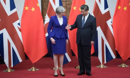 Theresa May meets with Chinese President Xi Jinping at the Diaoyutai State Guest House.