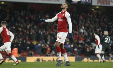 Arsenal’s Pierre-Emerick Aubameyang reacts after having his penalty saved by Manchester City’s goalkeeper Ederson.