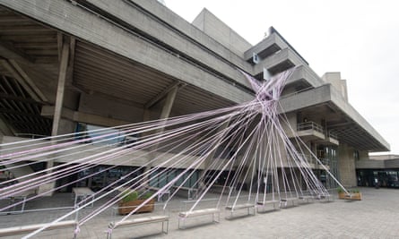 The National Theatre wrapped in tape this summer at the launch of the #MissingLiveTheatre campaign by UK theatre designers.