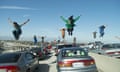 This image released by Lionsgate shows a dance scene from the Oscar-nominated film, "La La Land." It's not easy to stage a successful dance scene for the cameras, especially on a highway interchange, but when such a scene works, it can be memorable. (Dale Robinette/Lionsgate via AP)