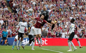 Aston Villa’s John McGinn scores the winner against Derby last May