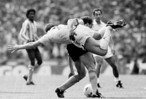 Coventry’s Trevor Peake using an unorthodox manner to deal with Spurs’ Clive Allen.