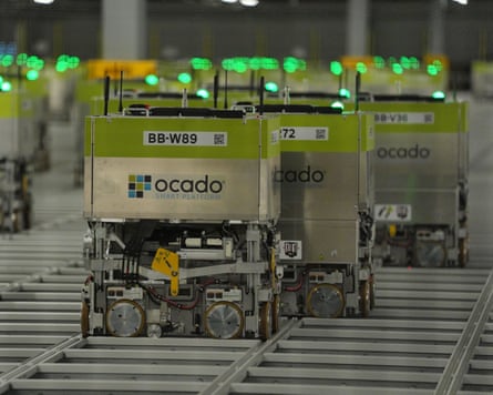 Picking machines at Ocado’s distribution warehouse